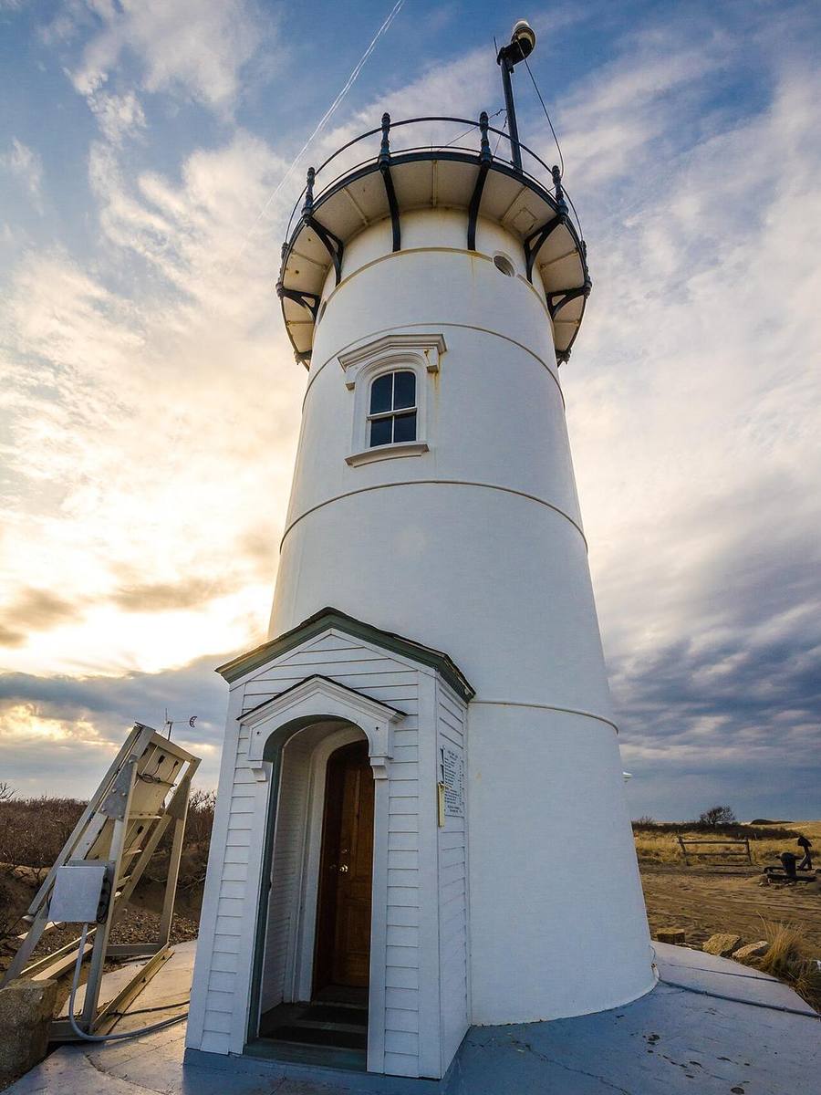 Race Point Lighthouse under a wide sky