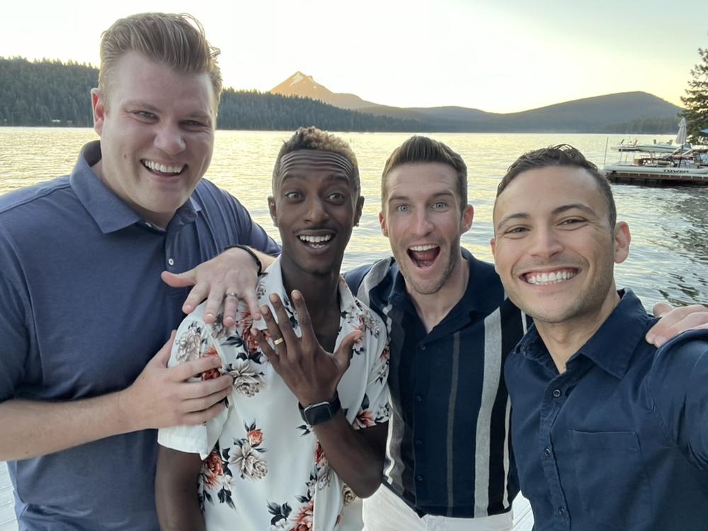 The four of us on a dock